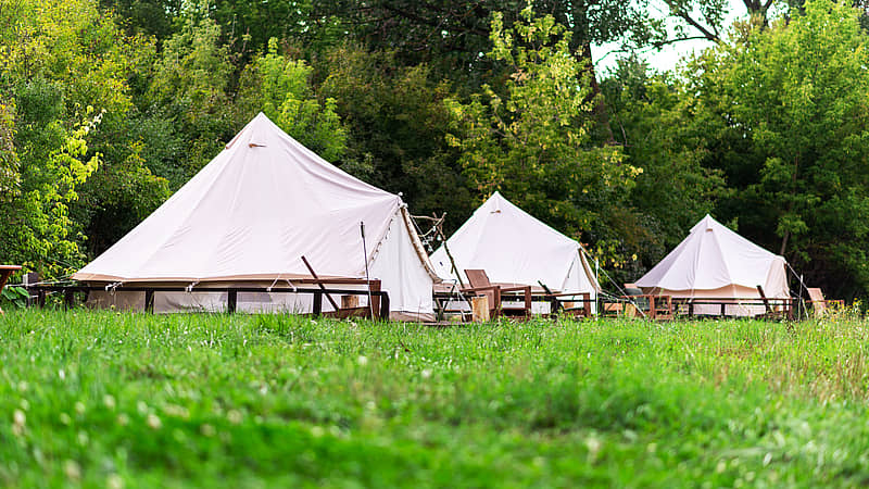 luxury tents in the woods with accommodations for relaxing
