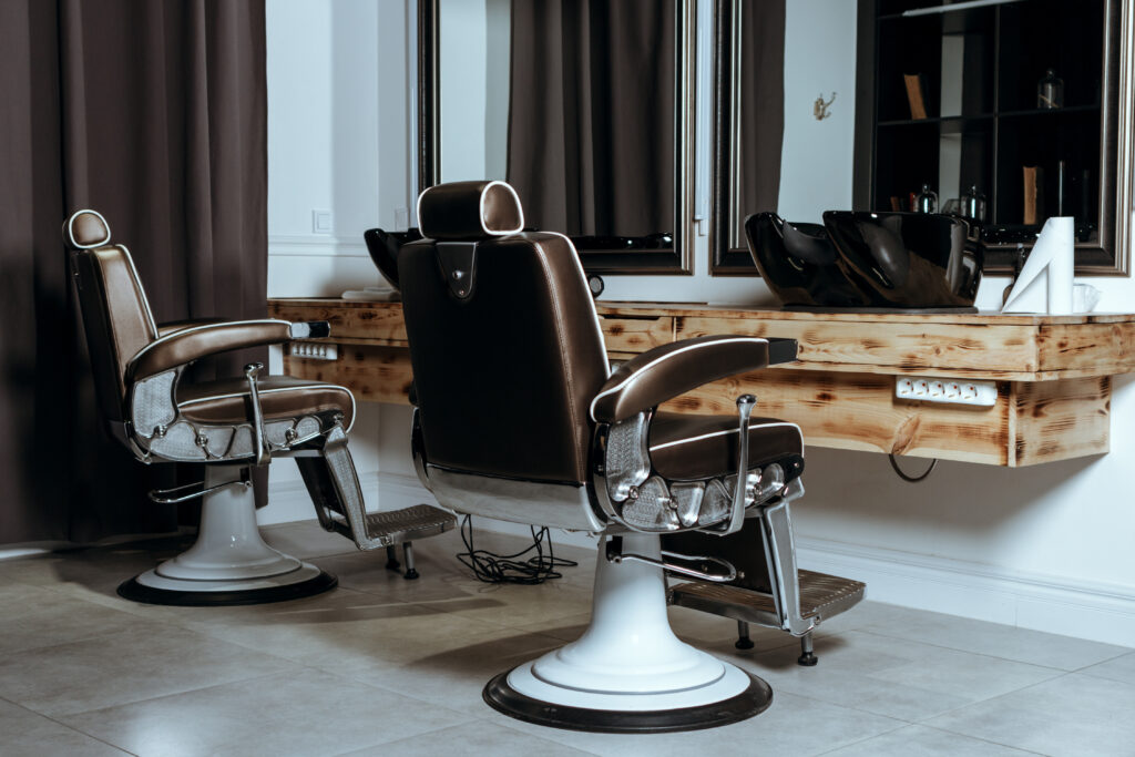 chairs inside of a barber shop 