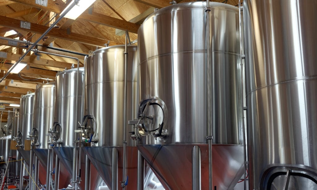 image showing beer being distilled in a taproom