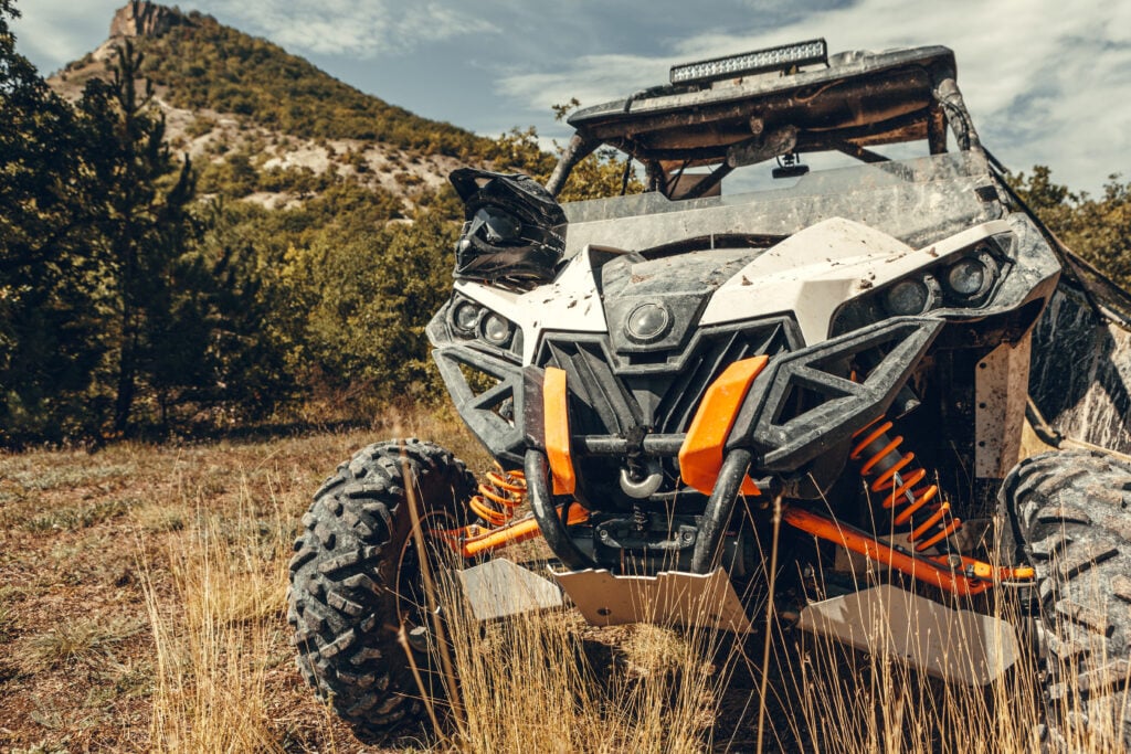 scenic setting including an atv with helmet