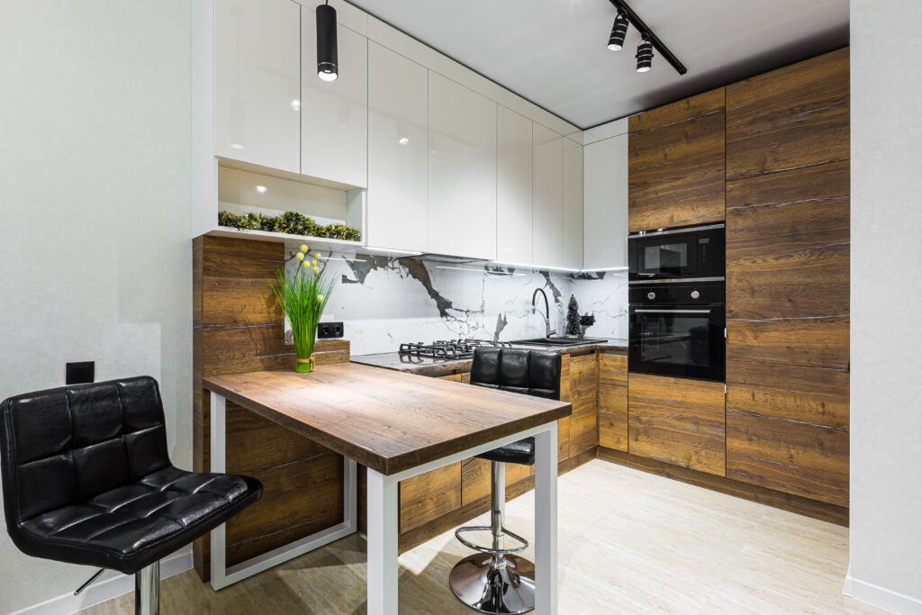 a modern kitchen inside of an apartment
