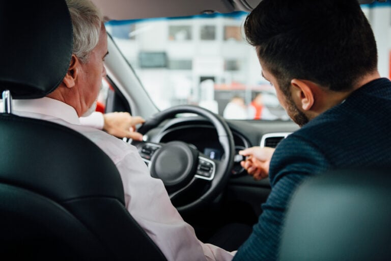 two people in a car