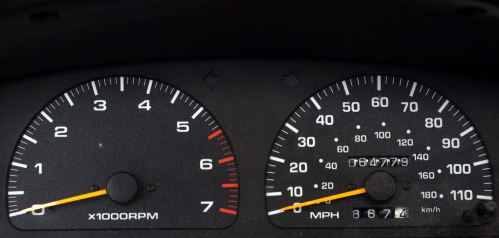odometer of a used car showing how many miles have been driven 