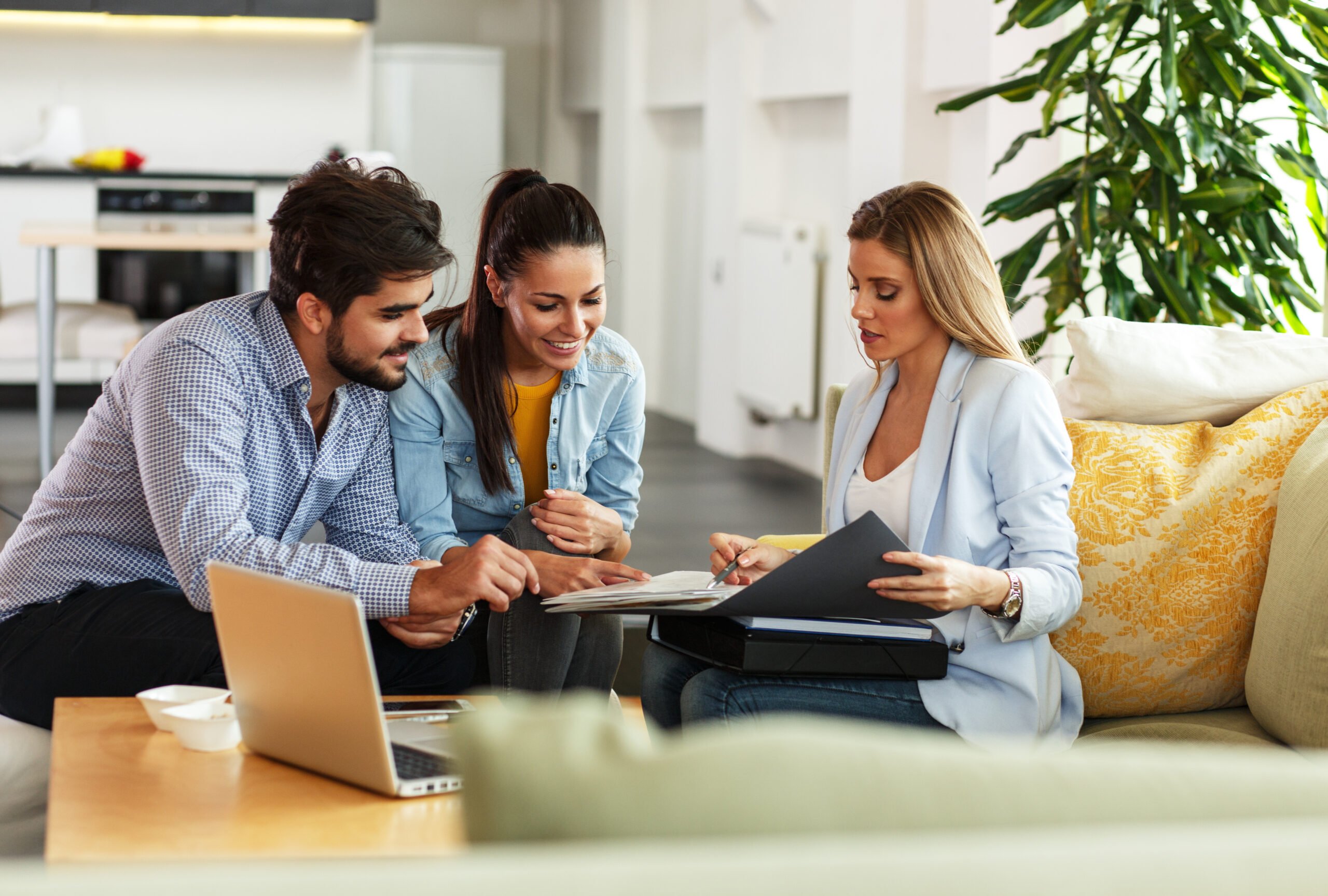 group of people reviewing paperwork