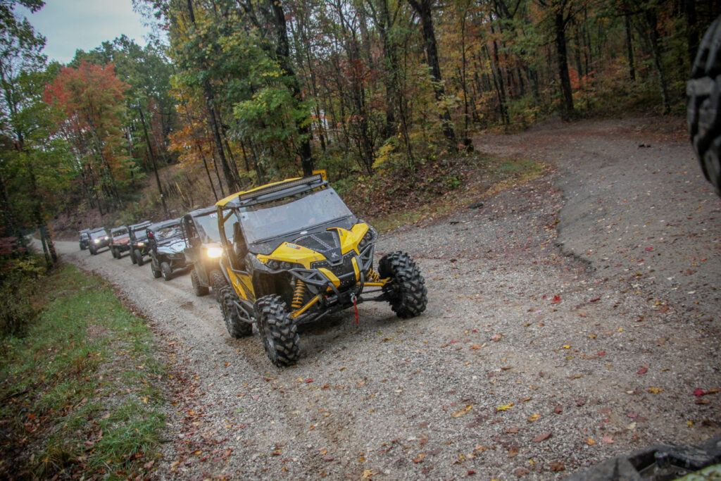 group of utvs on a wildreness trail