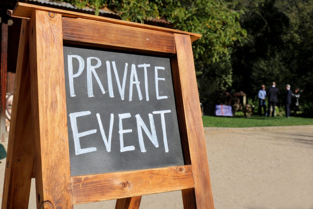 sign displaying private event for attendees