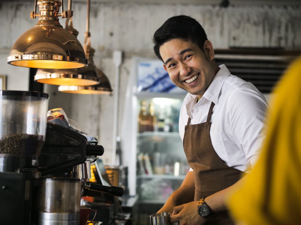 image of business owner working at his restaurant