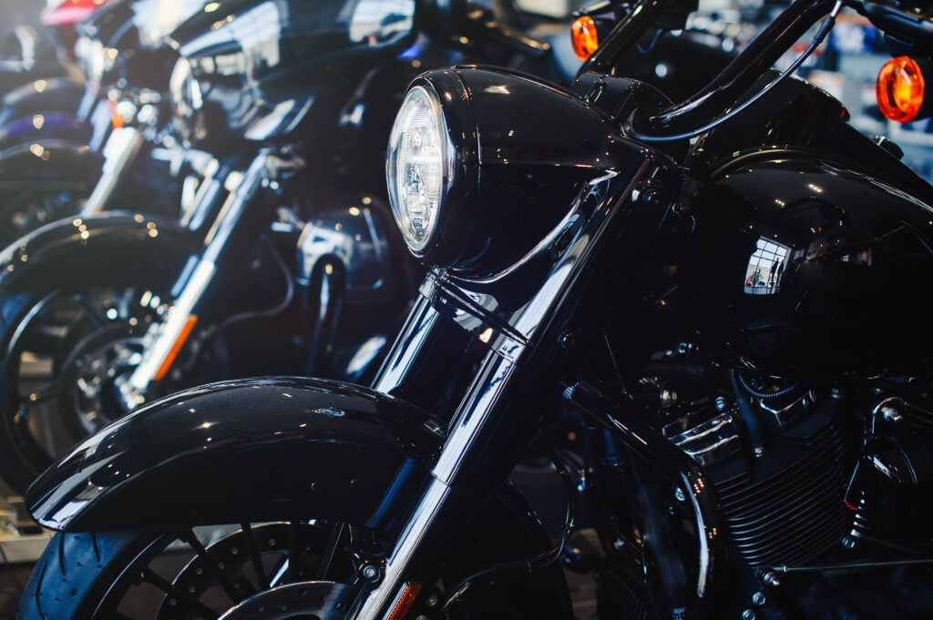 close up of motorcycles in dealership showroom