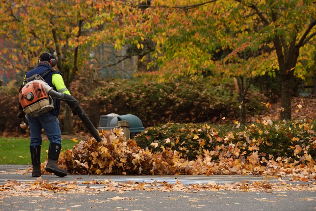 A landscaping business works on a fall cleanup in the off-season